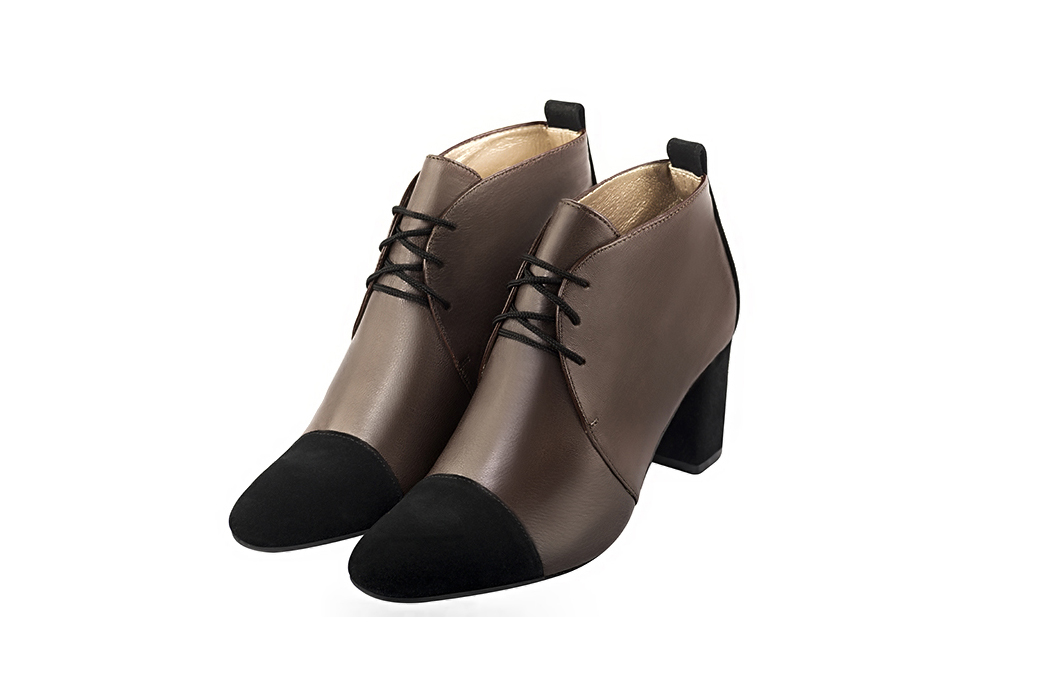 Matt black and dark brown women's ankle boots with laces at the front. Round toe. Medium block heels. Front view - Florence KOOIJMAN